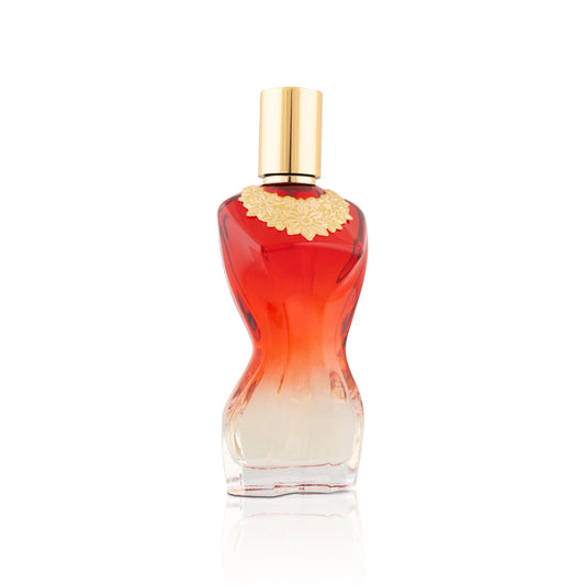 Red and gold perfume bottle on a white background